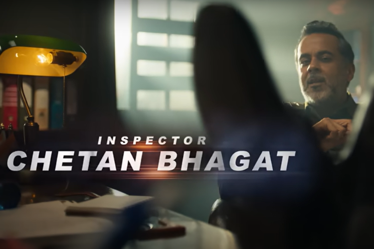 Chetan Bhagat dons the cop uniform for Henry Harvin