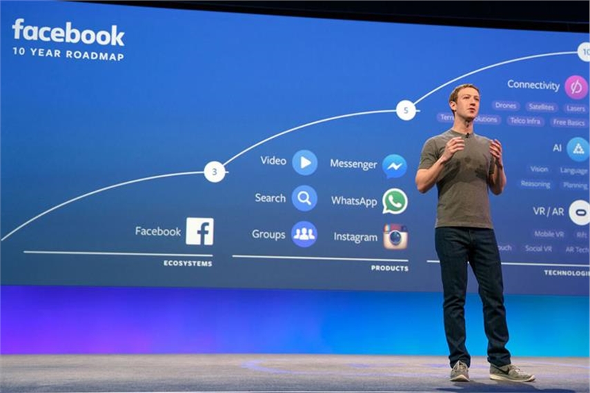 Facebook revenues up 33%, but Zuckerberg admits user 'saturation'